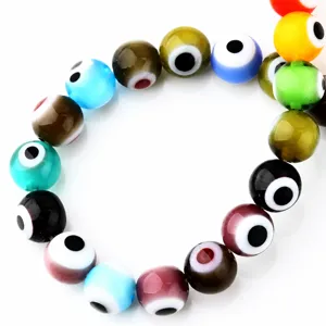Detailed view of colorful glass evil eye beads, 6mm round loose beads for jewelry making.
