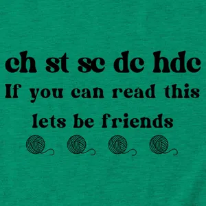 Green crochet hobby graphic short sleeve t-shirt detail showing fun text print design.