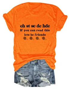 Orange short sleeve t-shirt with funny crochet text print and denim shorts outfit.