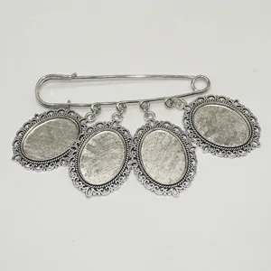 Vista dettagliata della spilla in argento antico fai da te, ideale per la creazione di gioielli.