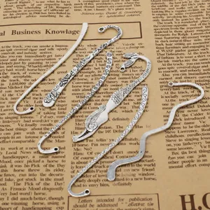 Vintage metal alloy bookmarks and hair sticks, intricate hollow carved designs for reading.