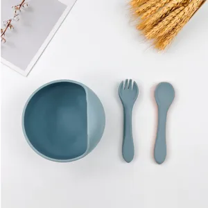 Baby silicone feeding set with snail bowl fork and spoon, toddler safe tableware for food.
