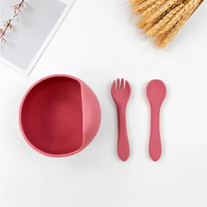 Baby silicone feeding set with snail bowl, fork and spoon. Toddler tableware for safe eating.