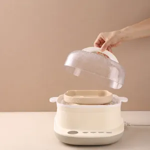 Cuoci pappa multifunzione per neonati con piatto orsetto carino e coperchio trasparente.