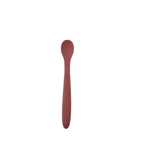 Baby silicone training spoon for infant feeding, soft food grade toddler tableware.