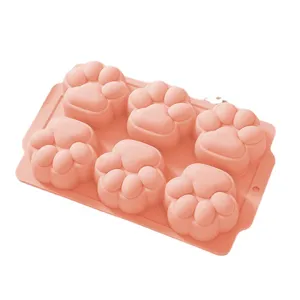 Pink 6-cavity silicone cat paw mold for baking, jelly, and baby food DIY treats.