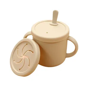 Baby silicone sippy cup snack cup set with dual handles and leak-proof lid for toddlers.