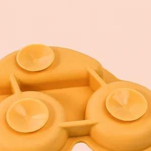 Silicone baby suction plate detail showcasing bottom car shape with three strong suction cups