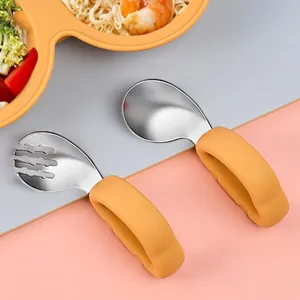 Silicone short handle fork and spoon detail view, safe stainless steel baby tableware set.