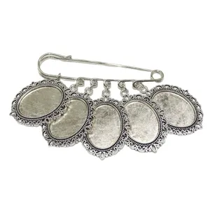 Spilla vintage argentata con cinque vassoi ovali per creazione di gioielli da sposa fai da te.