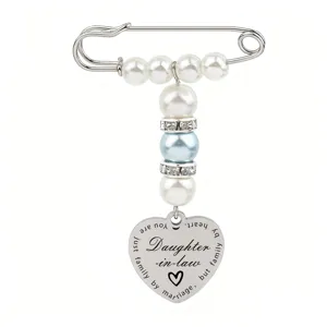 Bridal bouquet pin pearl heart brooch pendant detail, elegant wedding accessory for daughter-in-law.