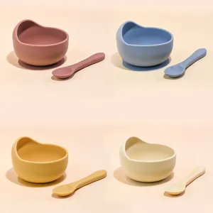 Baby silicone suction bowl and spoon set, multi-color infant feeding tableware details.