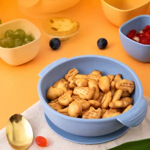 Baby silicone complementary food bowl with suction cup and double ears, safe infant tableware.