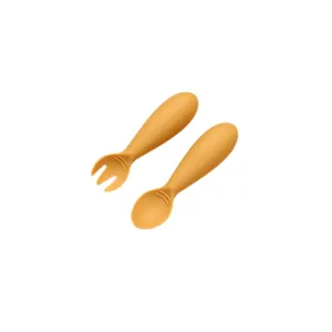 Silicone baby fork and spoon set, toddler self-feeding training utensils in bright yellow color.