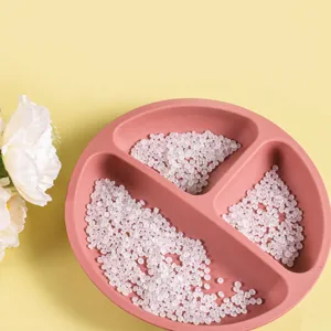 Infant silicone dinner plate with partitioned sections, safe and durable baby feeding tableware.