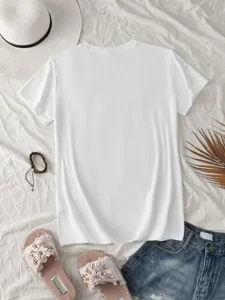 Casual solid white crew neck t-shirt flat lay view showcasing summer vacation style and props.