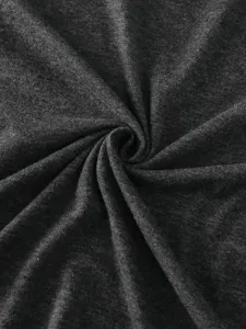 Dark gray cotton fabric detail close-up, soft knit texture for comfortable casual t-shirts.