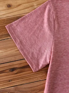 Detail view of the solid color heather short sleeve t-shirt, showcasing soft fabric texture.