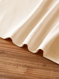Detail shot of casual solid color short sleeve t-shirt fabric, soft cotton material.