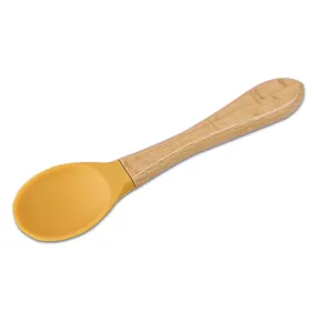 Silicone wooden handle baby training spoon, yellow food grade feeding spoon for infants.