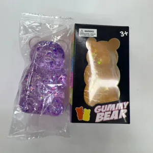 Glitter purple gummy bear squishy toy with packaging box, cute stress relief decompression toy.