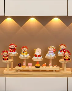 Creative wooden display stand with cute cartoon god of wealth figurines for home and office.