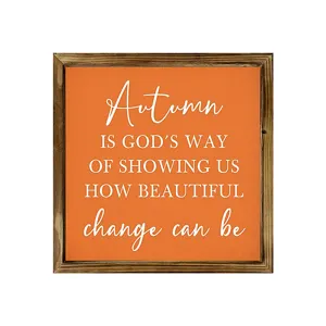Rustic autumn wooden sign with inspiring quote, orange wall plaque for seasonal home decor.