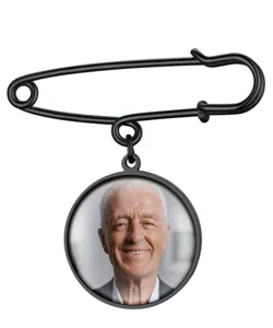 Black metal safety pin brooch with round photo glass pendant for custom DIY jewelry gifts.