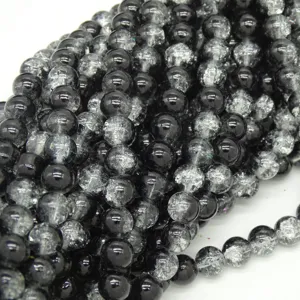 Detailed view of black crackle glass beads, perfect for DIY jewelry making and apparel accessories.