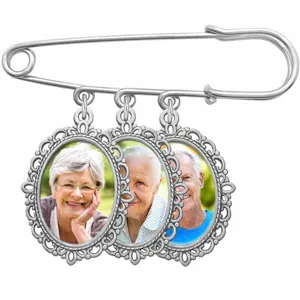 Silver tone safety pin brooch with three oval photo frames for DIY memory charms detail