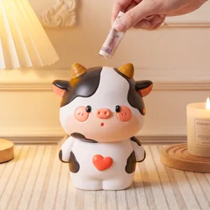 Cute cartoon cow piggy bank for kids, large capacity drop-resistant money saving storage box.