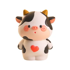 Cute cow piggy bank for kids, large capacity coin saving box, lovely desktop ornament gift.