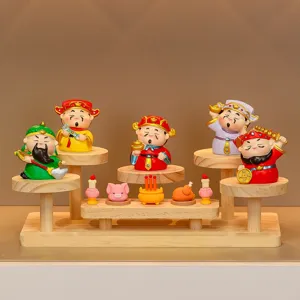 Cute cartoon wealth god figurines set with tiered wooden display shelf for home decor.