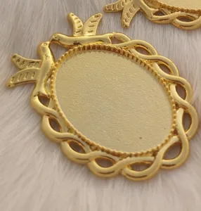 Vintage gold alloy oval bezel tray pendant base for DIY jewelry making crafts detail view.