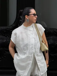 New Chinese style embroidered hollow mandarin collar white short sleeve shirt for women.