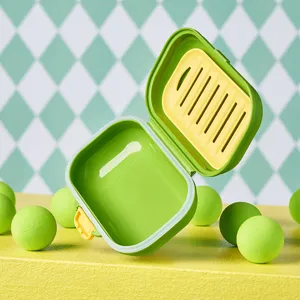 Portable travel soap box with draining layer, sealed plastic soap holder for home and travel use.