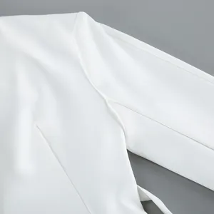 White women blazer detail view featuring elegant split sleeves and sharp V-neck design.