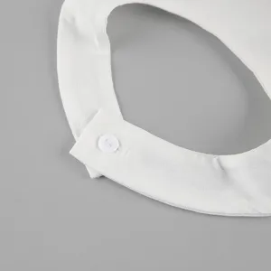 White halter neck sleeveless top detail view, minimalist solid color casual women clothing.