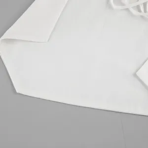Close-up detail of a solid color sleeveless halter top fabric showing fine stitching.
