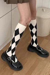 Black and white argyle mid-calf socks for women, preppy JK style knit hosiery.