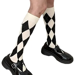 Classic black and white argyle knee high socks for women, perfect JK school style daily wear.