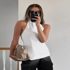 Sexy backless halter sleeveless vest top for women, minimalist solid color summer casual wear.
