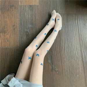 Sheer thin tights featuring delicate blue butterfly print, offering a stylish and trendy look for summer.