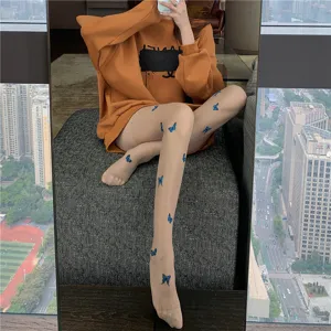 Sheer pantyhose featuring delicate blue butterfly print, sexy and stylish hosiery for summer.