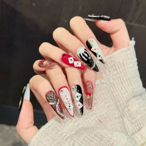 Handmade press-on nails with gothic poker mask design, long stiletto sparkly acrylic fake nails.