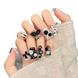 Schwarze weiße Noten Kamelie künstliche Nägel, coole Press on Nails Kunstflecken für Damen.