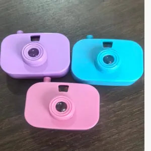 Juguete camara proyeccion infantil, mini camara de plastico color purpura, azul, rosa.