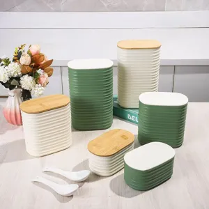 Detailed view of ribbed plastic storage jars with bamboo and white lids set, organized.