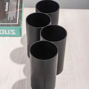 Detail view of the 4-compartment black plastic multi-functional storage holder and drainer.
