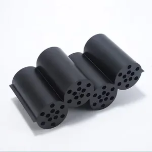 Close-up detail view of black 4-compartment storage holder with multi-cylinder design.